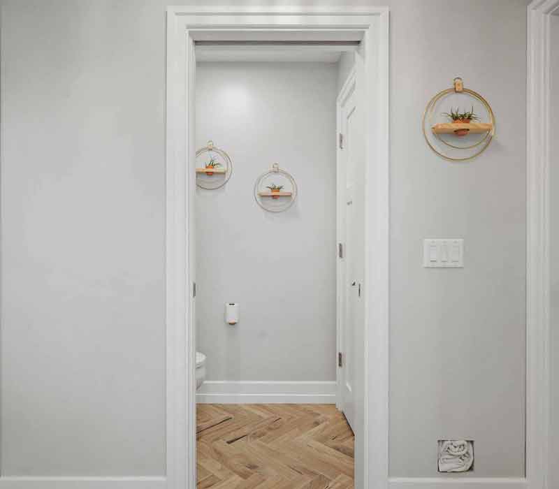 A primary suite was reimagined as a sanctuary of comfort and elegance, while the kids’ bath received a stylish refresh designed to grow with the family.