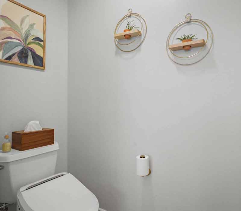 A primary suite was reimagined as a sanctuary of comfort and elegance, while the kids’ bath received a stylish refresh designed to grow with the family.