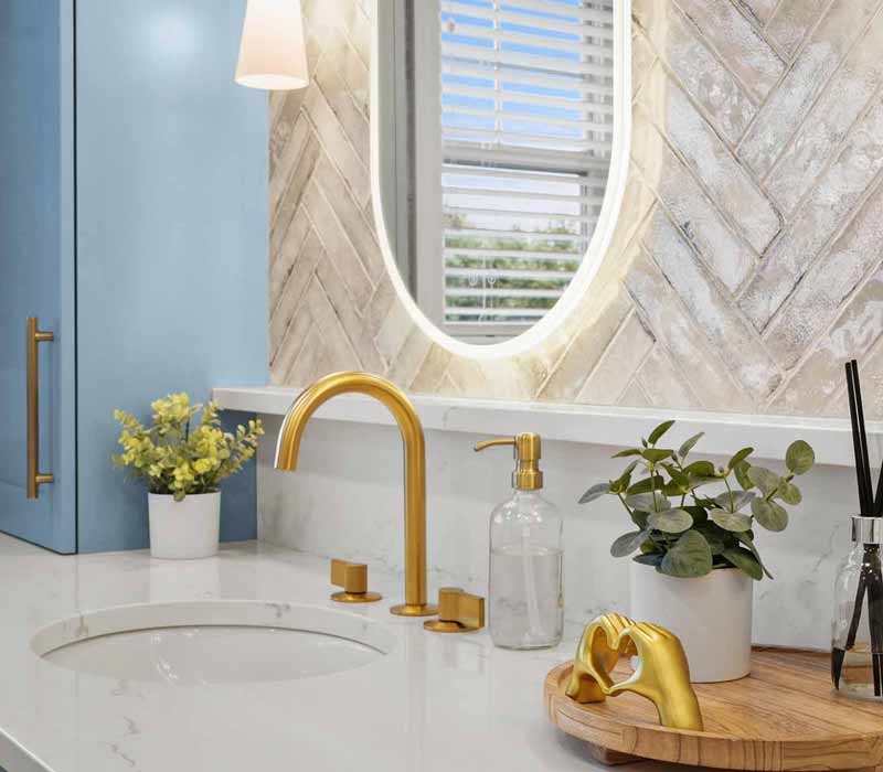 A primary suite was reimagined as a sanctuary of comfort and elegance, while the kids’ bath received a stylish refresh designed to grow with the family.