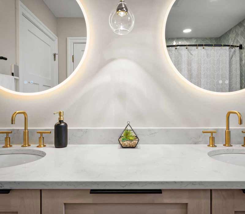 A primary suite was reimagined as a sanctuary of comfort and elegance, while the kids’ bath received a stylish refresh designed to grow with the family.