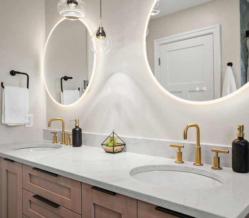 A primary suite was reimagined as a sanctuary of comfort and elegance, while the kids’ bath received a stylish refresh designed to grow with the family.