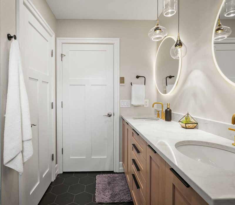 A primary suite was reimagined as a sanctuary of comfort and elegance, while the kids’ bath received a stylish refresh designed to grow with the family.