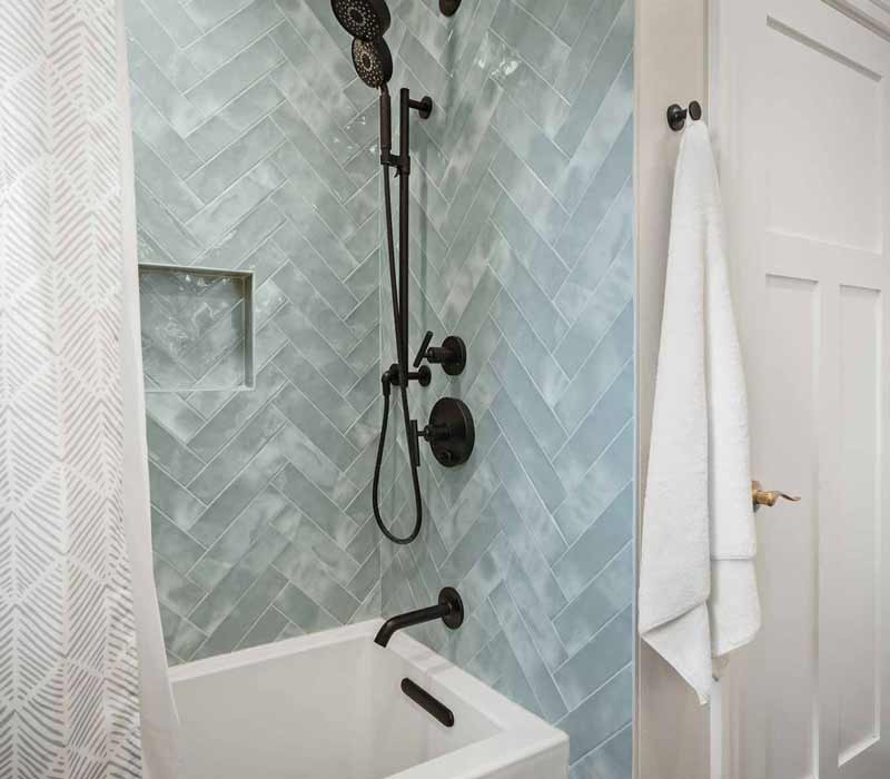 A primary suite was reimagined as a sanctuary of comfort and elegance, while the kids’ bath received a stylish refresh designed to grow with the family.