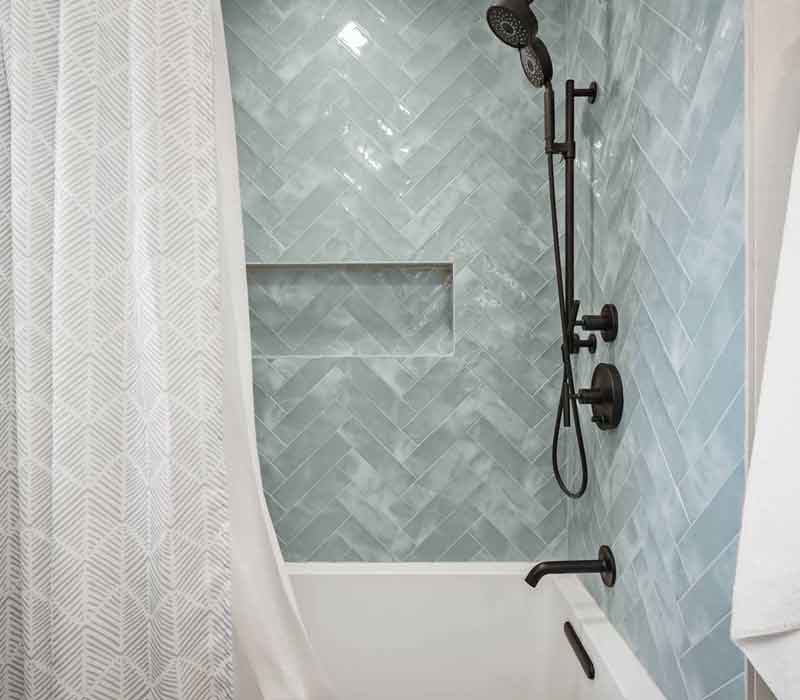 A primary suite was reimagined as a sanctuary of comfort and elegance, while the kids’ bath received a stylish refresh designed to grow with the family.