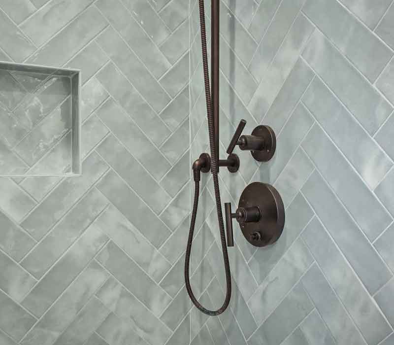 A primary suite was reimagined as a sanctuary of comfort and elegance, while the kids’ bath received a stylish refresh designed to grow with the family.