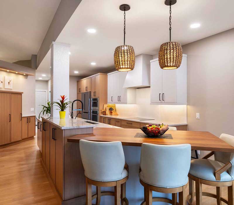 This full kitchen remodel blends natural warmth with refined modernity, crafting a space that is as inviting as it is impeccably tailored. It features custom DHDK cabinetry, Taj Majal quartzite, Bosch stainless steel appliances, and intuitive storage options.