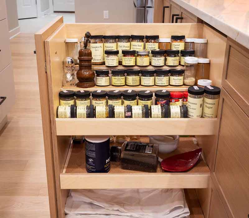 This full kitchen remodel blends natural warmth with refined modernity, crafting a space that is as inviting as it is impeccably tailored. It features custom DHDK cabinetry, Taj Majal quartzite, Bosch stainless steel appliances, and intuitive storage options.