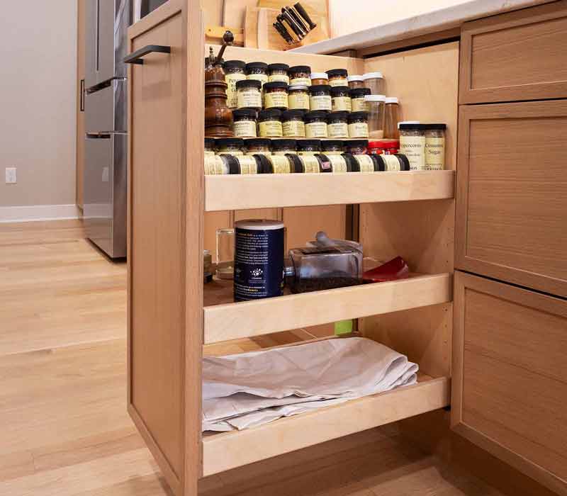 This full kitchen remodel blends natural warmth with refined modernity, crafting a space that is as inviting as it is impeccably tailored. It features custom DHDK cabinetry, Taj Majal quartzite, Bosch stainless steel appliances, and intuitive storage options.