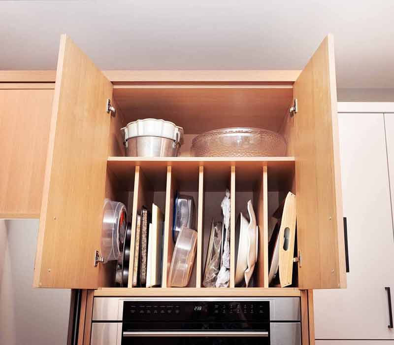 This full kitchen remodel blends natural warmth with refined modernity, crafting a space that is as inviting as it is impeccably tailored. It features custom DHDK cabinetry, Taj Majal quartzite, Bosch stainless steel appliances, and intuitive storage options.