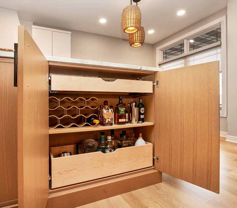 This full kitchen remodel blends natural warmth with refined modernity, crafting a space that is as inviting as it is impeccably tailored. It features custom DHDK cabinetry, Taj Majal quartzite, Bosch stainless steel appliances, and intuitive storage options.