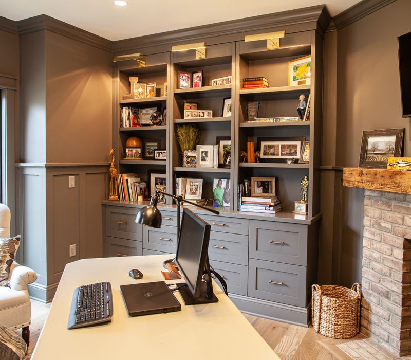 This country home has a rustic chic style with rough-hewn exposed wood beams, hand-painted terra cotta tiles, and a stone turret.