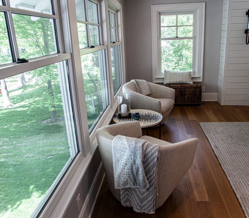 Subway tiles, white cabinetry, and coffered and beadboard ceilings add a sophisticated touch to this comfortable classic home. 