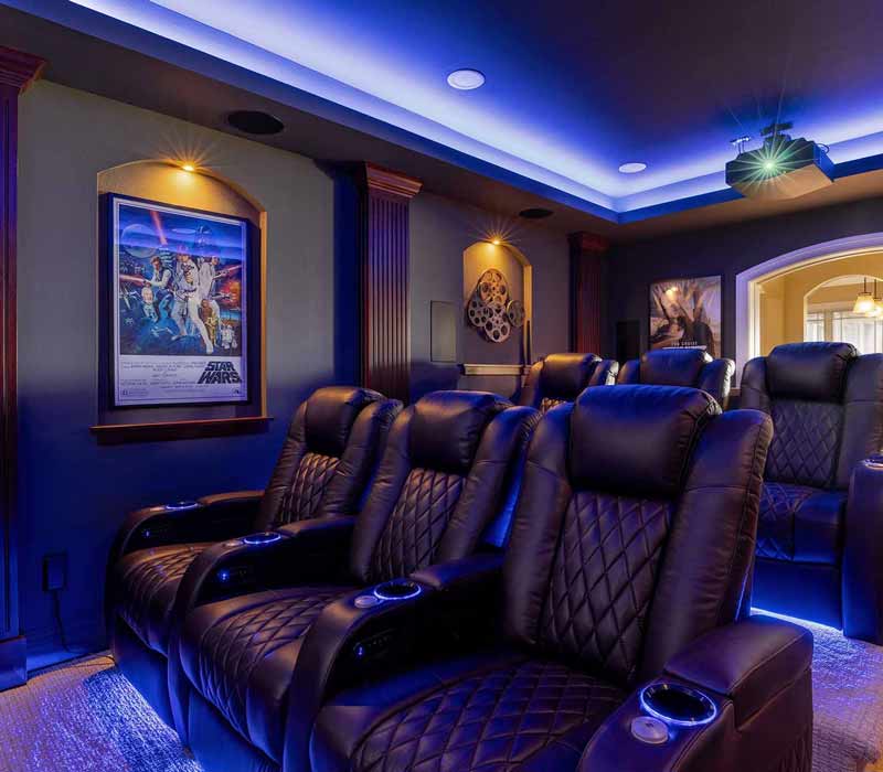 We transformed this basement into a luxurious retreat complete with a theater room, family room, bar, and game room. The remodel employs a traditional style and elevates everyday living.