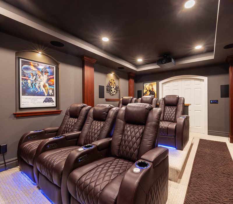 We transformed this basement into a luxurious retreat complete with a theater room, family room, bar, and game room. The remodel employs a traditional style and elevates everyday living.