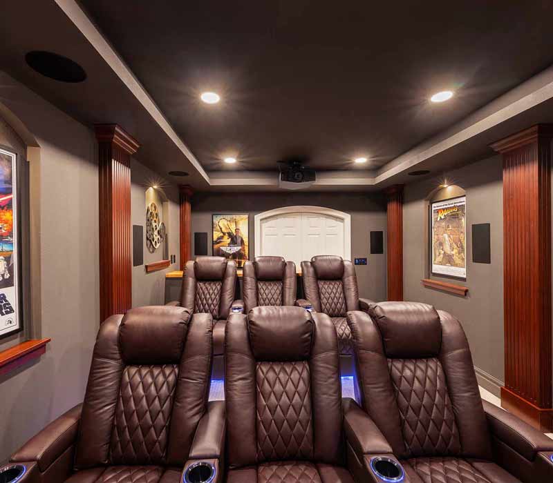 We transformed this basement into a luxurious retreat complete with a theater room, family room, bar, and game room. The remodel employs a traditional style and elevates everyday living.