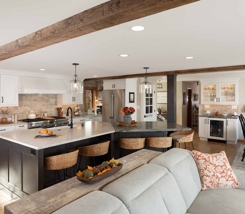 This full kitchen reconfiguration and primary suite remodel reimagines lakeside living with a blend of relaxed comfort and understated indulgence. 