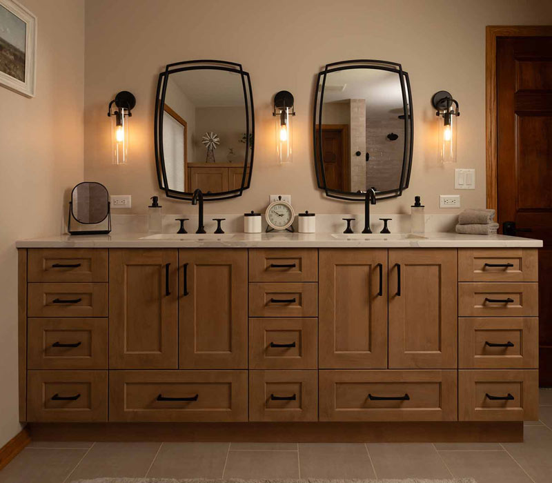 This full kitchen reconfiguration and primary suite remodel reimagines lakeside living with a blend of relaxed comfort and understated indulgence. 