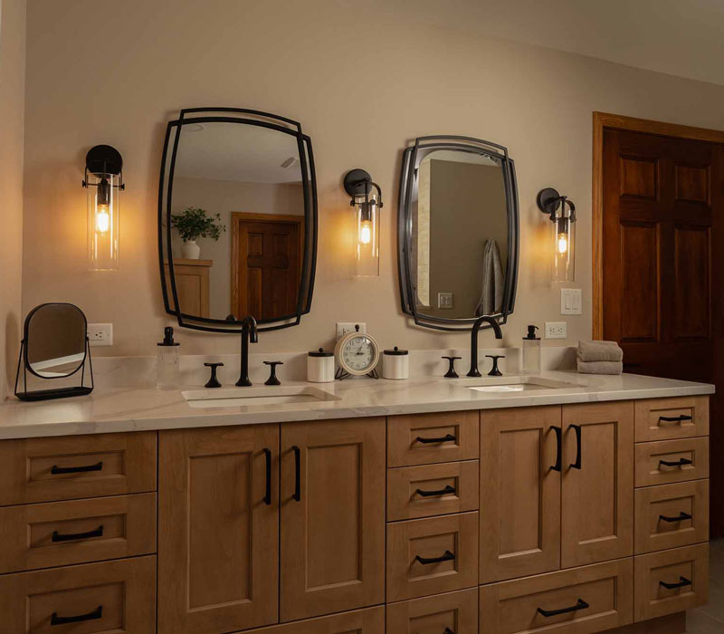 This full kitchen reconfiguration and primary suite remodel reimagines lakeside living with a blend of relaxed comfort and understated indulgence. 