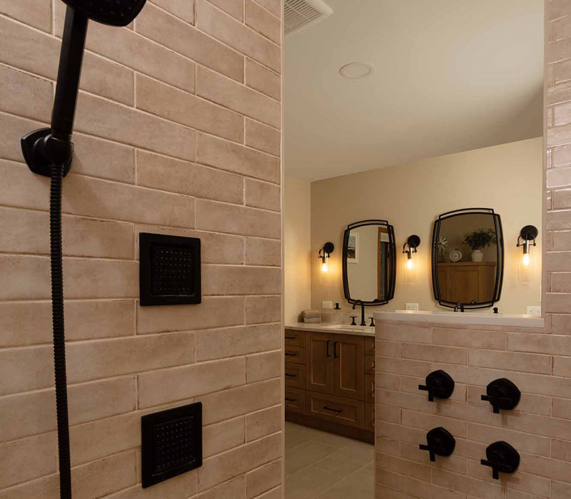 This full kitchen reconfiguration and primary suite remodel reimagines lakeside living with a blend of relaxed comfort and understated indulgence. 