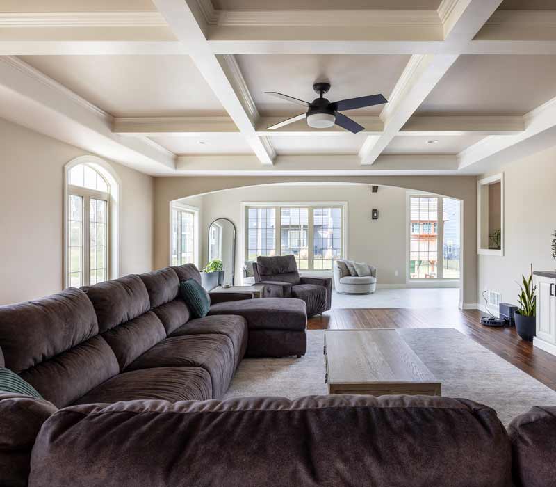 With a refined transitional style and a palette of timeless neutrals, this home addition harmonizes perfectly with the house’s original character. The project added a flex space, new family room, children's nook, and luxe laundry room.