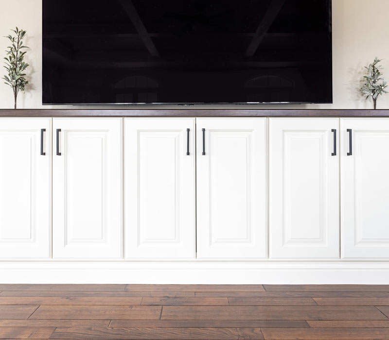 With a refined transitional style and a palette of timeless neutrals, this home addition harmonizes perfectly with the house’s original character. The project added a flex space, new family room, children's nook, and luxe laundry room.