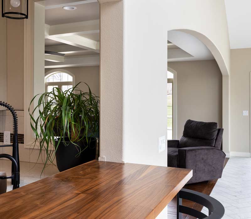 With a refined transitional style and a palette of timeless neutrals, this home addition harmonizes perfectly with the house’s original character. The project added a flex space, new family room, children's nook, and luxe laundry room.