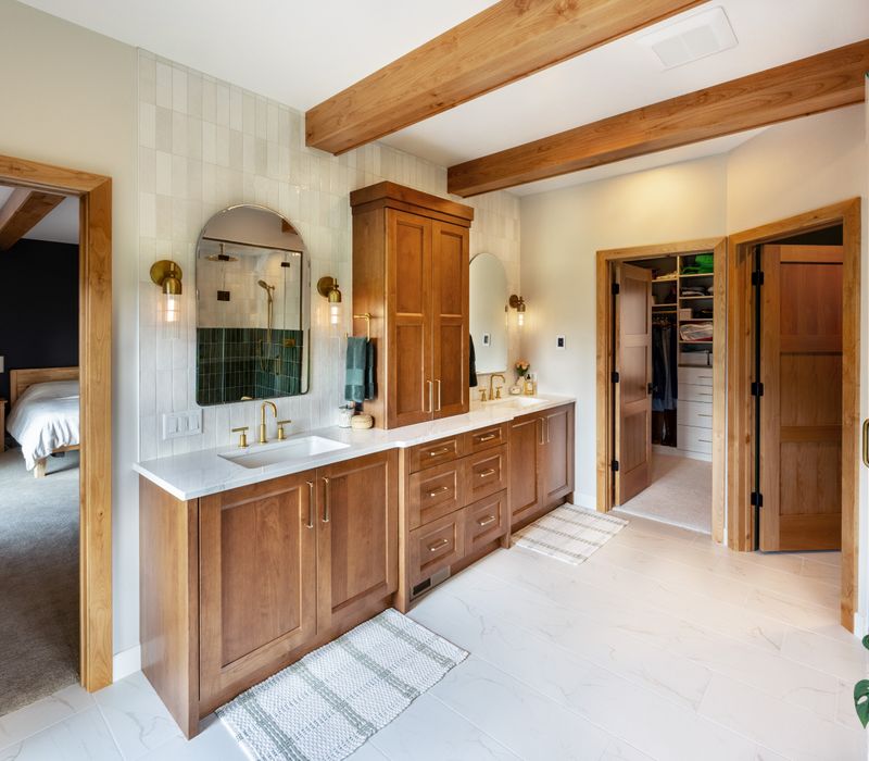 From the warm alder accents to the crisp custom cabinetry and elevated smart-shower system, this project enhances daily life for our clients through refined comfort, convenience, and timeless appeal.