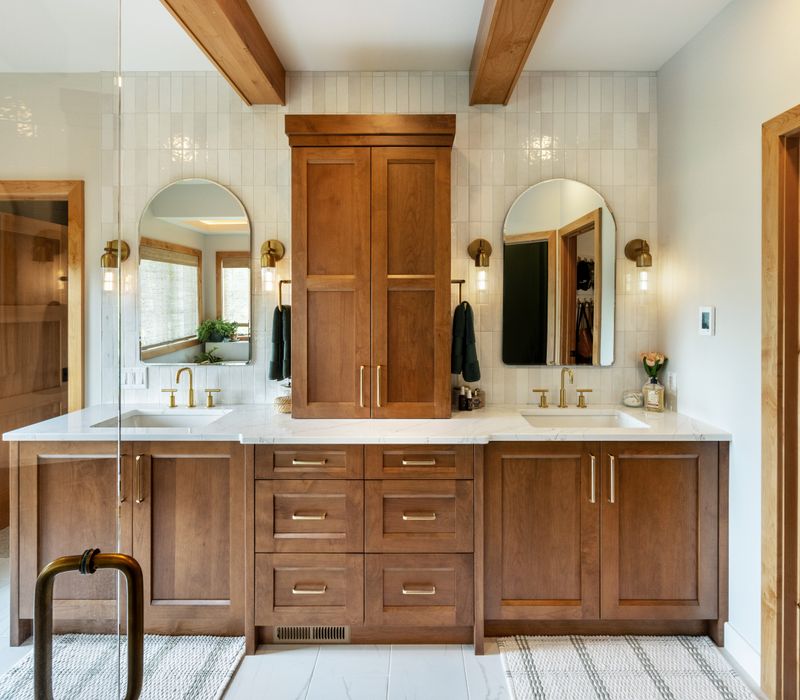 From the warm alder accents to the crisp custom cabinetry and elevated smart-shower system, this project enhances daily life for our clients through refined comfort, convenience, and timeless appeal.