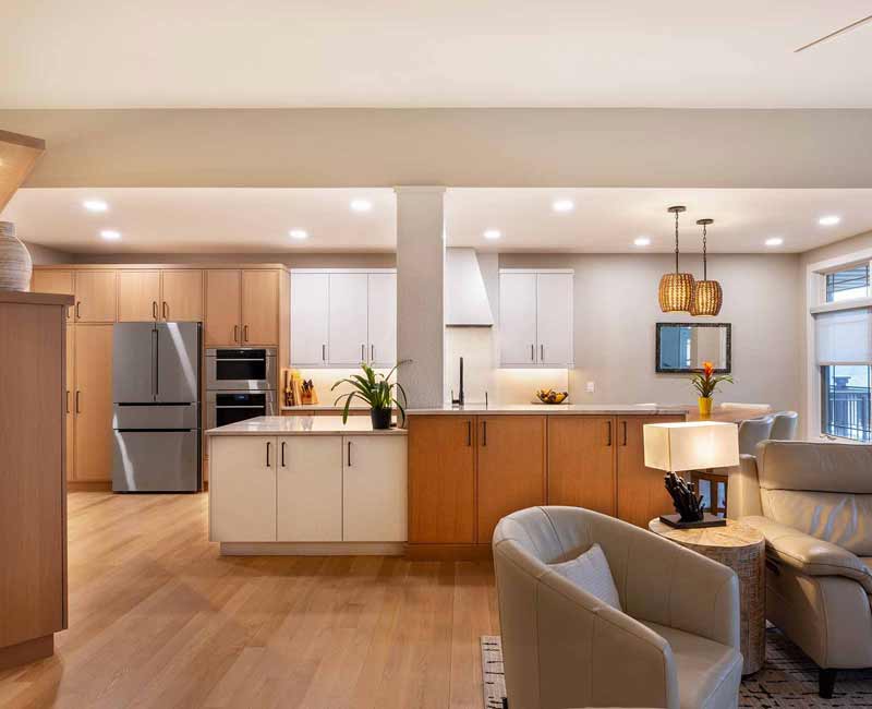 This full kitchen remodel blends natural warmth with refined modernity, crafting a space that is as inviting as it is impeccably tailored. It features custom DHDK cabinetry, Taj Majal quartzite, Bosch stainless steel appliances, and intuitive storage options.