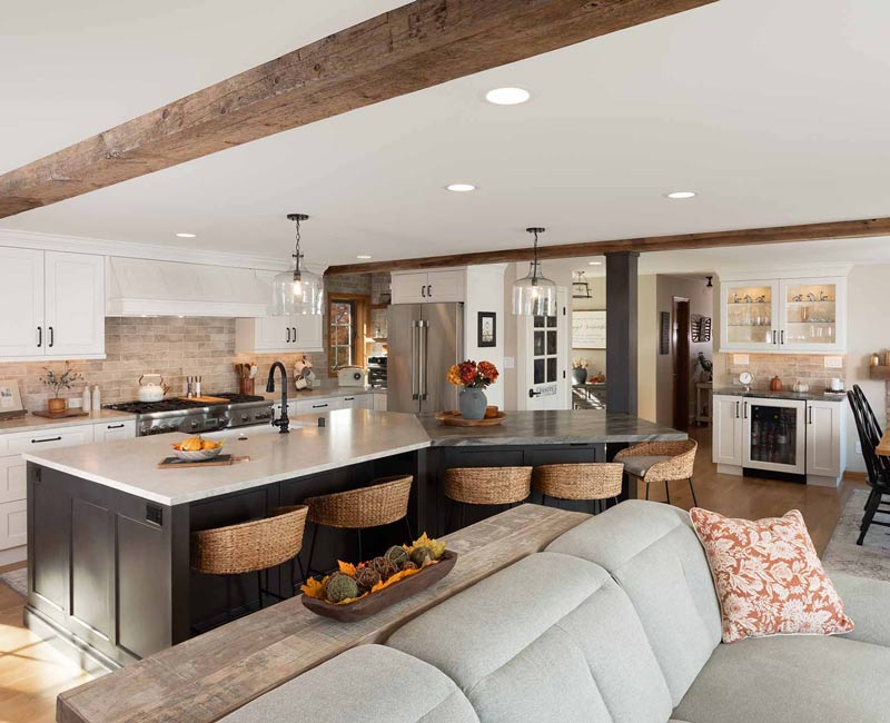 This full kitchen reconfiguration and primary suite remodel reimagines lakeside living with a blend of relaxed comfort and understated indulgence. 